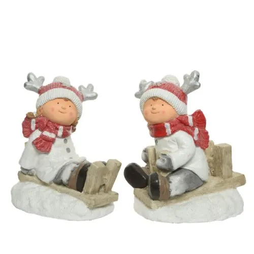 Novogodišnja figura dete na sankama