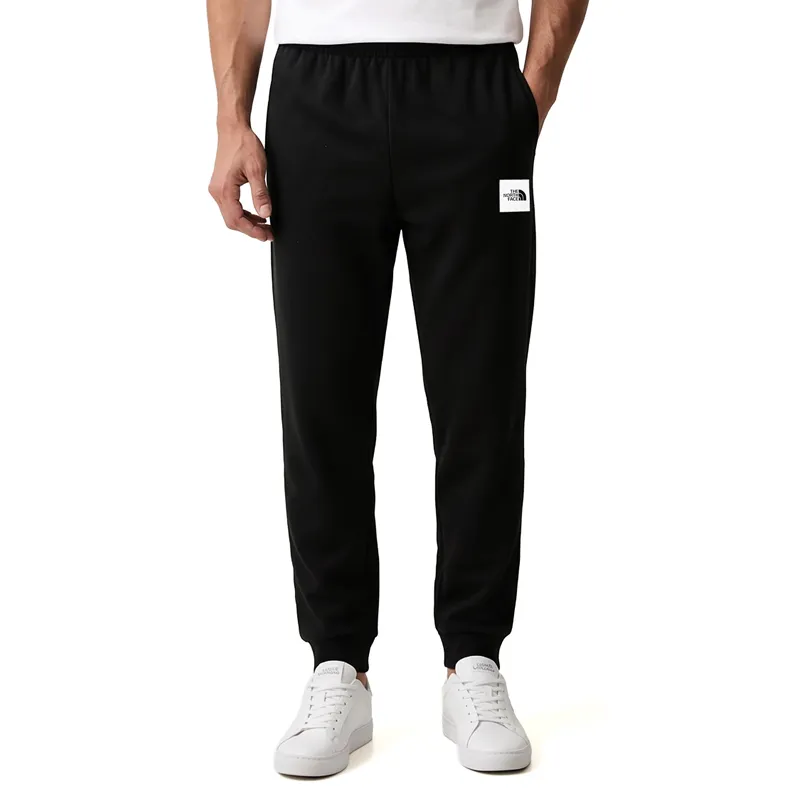 THE NORTH FACE DONJI DEO TRENERKE M EVO BOX HALF DOME REGULAR TAPERED JOGG TNF BLACK ZA MUŠKARCE
