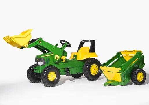 Traktor J.D. sa prikolicom i utovarivačem