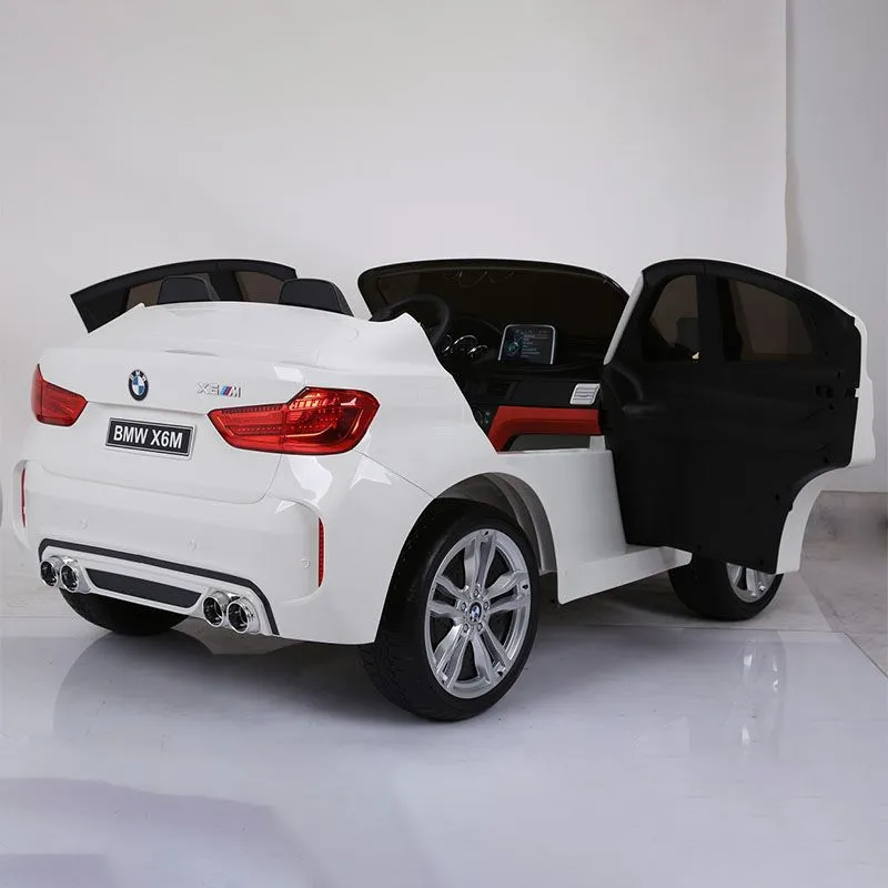 EUROBAJK Dečiji automobil na akumulator dvosed BMW X6 M, bela