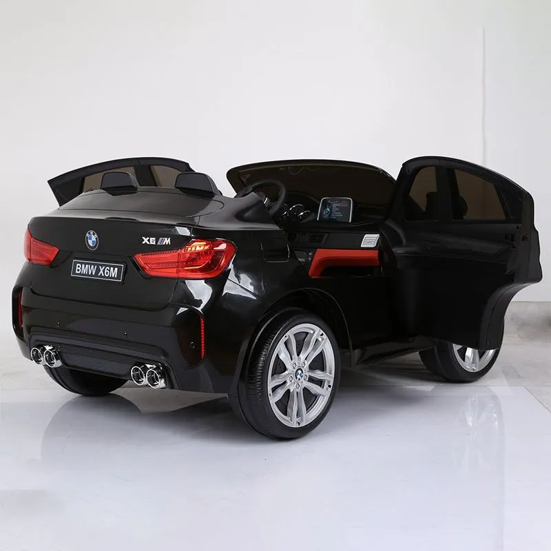 EUROBAJK Dečiji automobil na akumulator dvosed BMW X6 M, crna