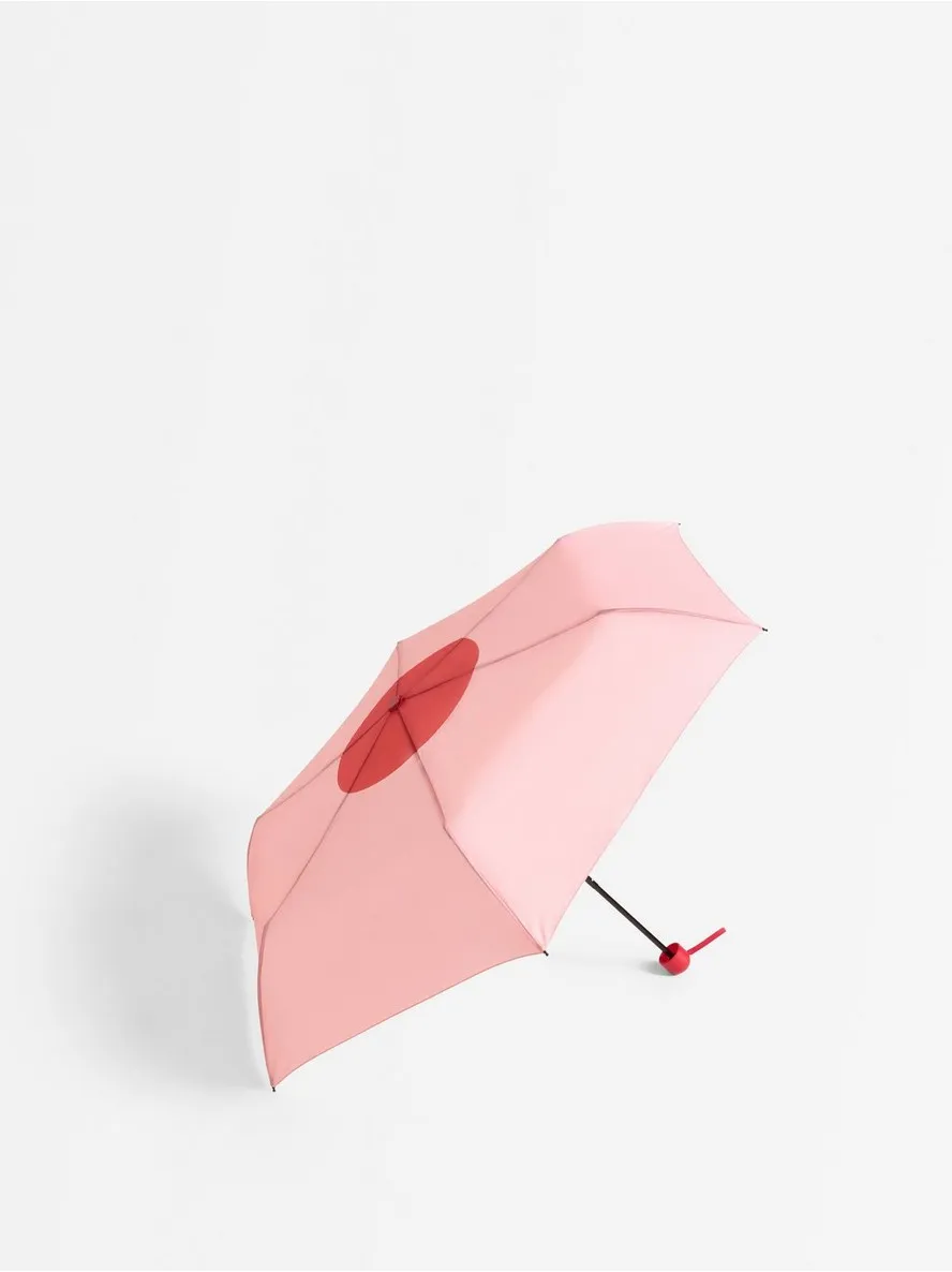 Pink kišobran – Umbrella Lindex x Jonas Frank