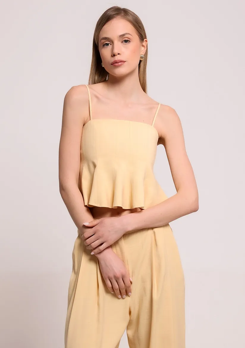 TOP SA PEPLUM DETALJEM